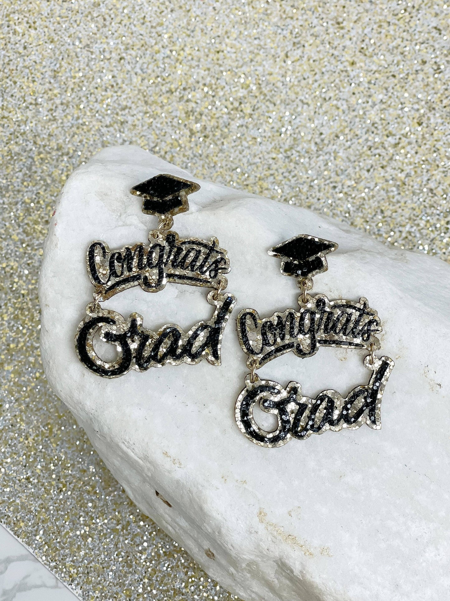 Prep Obsessed Wholesale - Gold Glitter Cursive 'Congrats Grad' Dangle Earrings