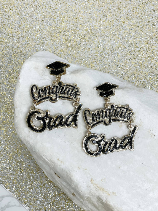 Prep Obsessed Wholesale - Gold Glitter Cursive 'Congrats Grad' Dangle Earrings